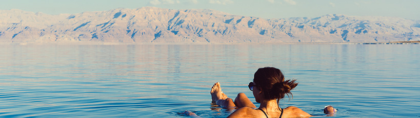 Where can you bathe in therapeutic mineral rich waters?